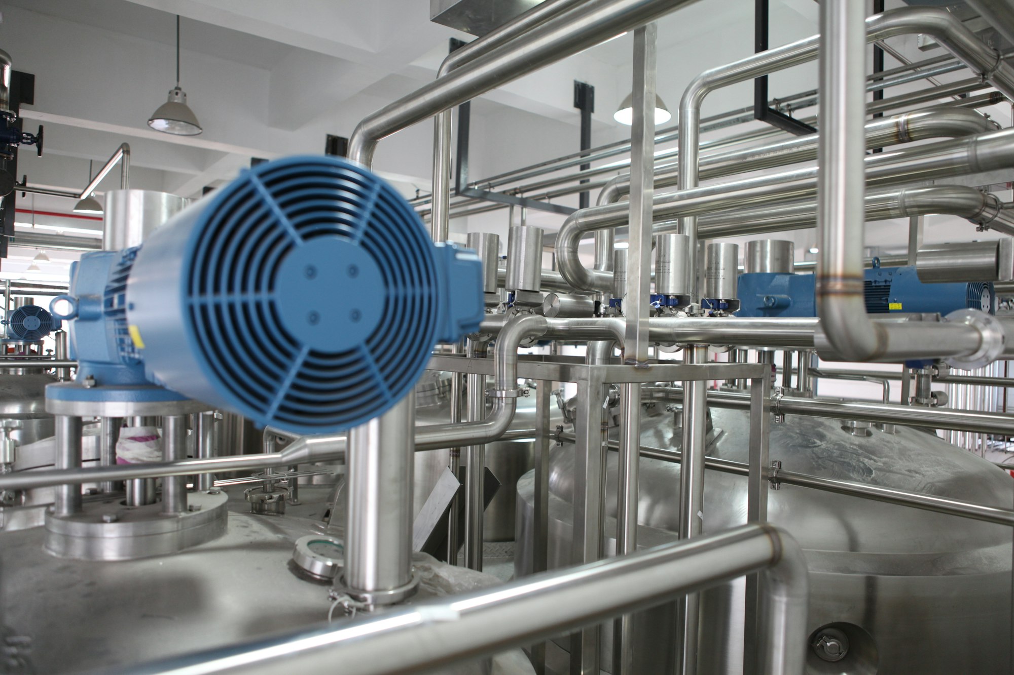Process piping and equipment inside an industrial plant